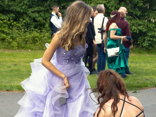 A student having a Cinderella moment at the Meden School prom.