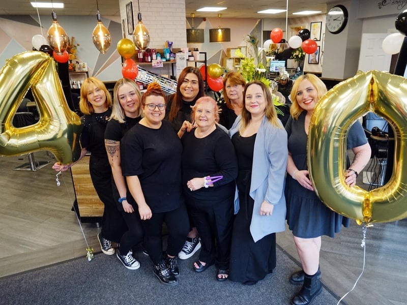 Friends Hair Company received a 4.6 star out of 5 rating based on 90 reviews. One review said: "Excellent service lovely staff very friendly I've been using friends now a couple of yrs for cuts and colour wouldn't go anywhere else." Pictured staff celebrating the Friends Hair Company's 40th birthday.