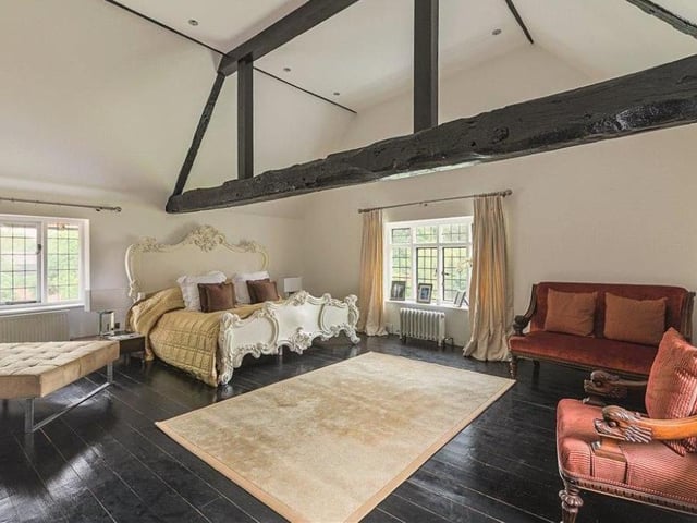 This spectacular, spacious bedroom is one of the highlights at Hurst Lodge, where there are 12 bedrooms in all, plus ten bathrooms. Set in 45 acres of parkland, the property comes with a converted coach house, farm buildings and a cottage.