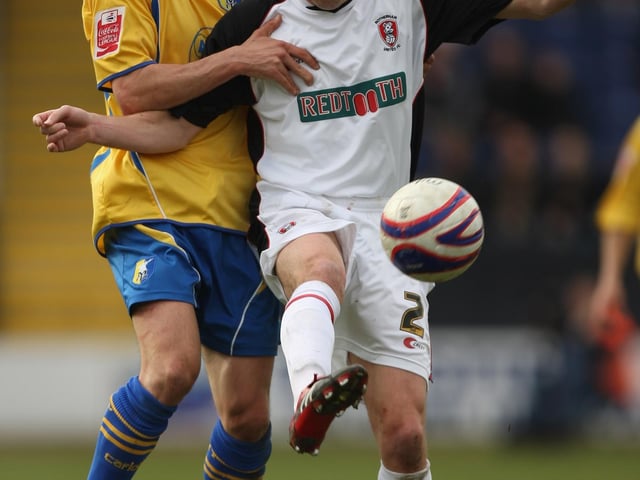 Dale Tonge tussles with Stags' Michael Boulding in the 2008 game.