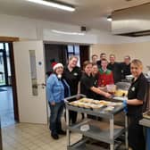 Cooking Christmas dinners for the community.