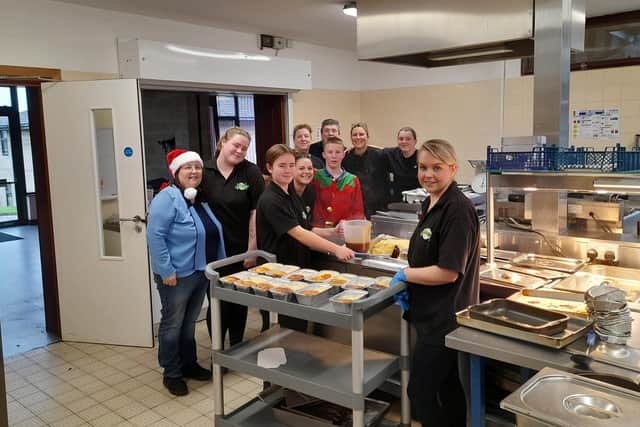 Cooking Christmas dinners for the community.