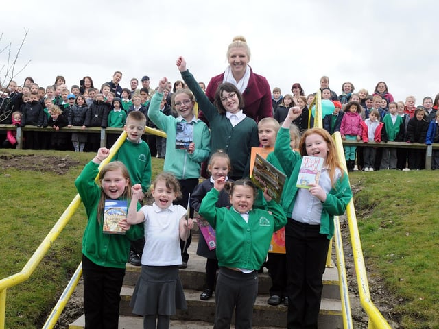 Rebecca Adlington with pupils at the Oak Tree Lane Primary School where she opened their new library.
