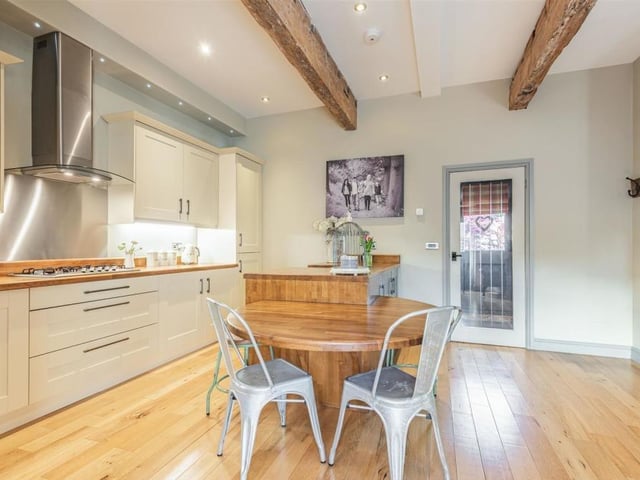 Adding to the polish and class of the kitchen/diner at Stone Steps Barn is an engineered oak floor, ceiling spotlights and underfloor heating.