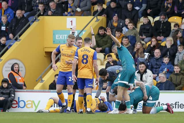 Medical help is called for as Riley Harbottle suffers a head injury on Saturday. Photo by Chris & Jeanette Holloway/The Bigger Picture.media