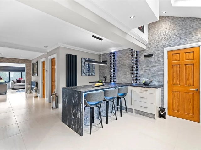 The property enjoys a lovely open plan layour at the heart of the home with the kitchen flowing into the utility area and sun room
