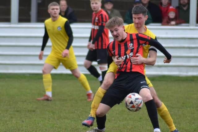 Action from Shirebrook's game with Parkgate.