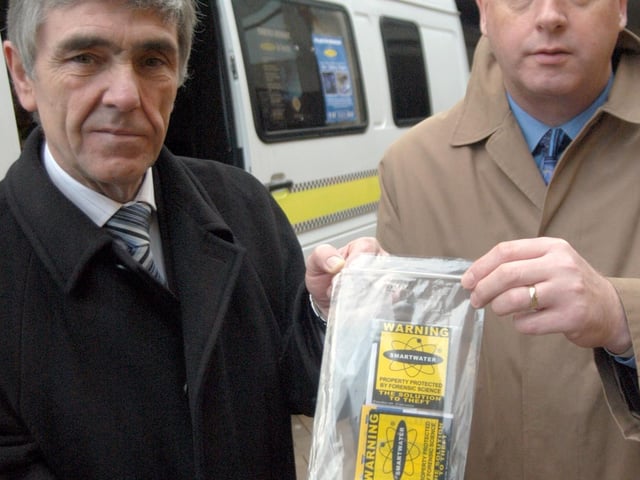 Coun Danny McCrossan, left, Portfolio Holder for Public Protection and Chris Thompson, from Mansfield and Ashfield Police Partnership, pictured at the smart water promotion in Mansfield in 2007.