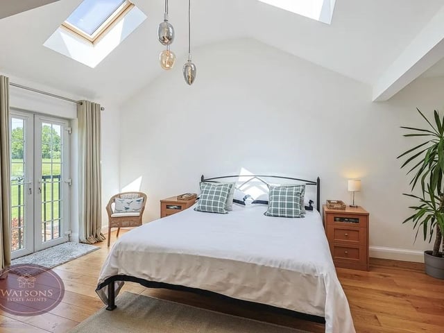 The property is flooded with natural light and stunning panoramic views
