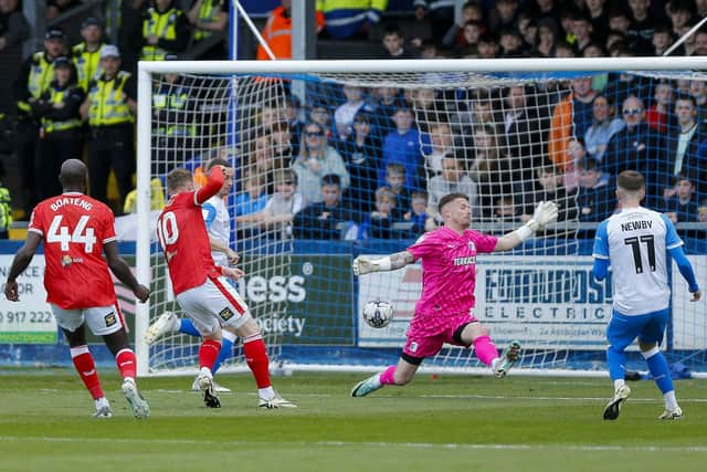 George Maris scores during the Sky Bet League 2 match against Barrow AFC at the SO Legal Stadium, 27 April 2024Photo credit : Chris & Jeanette Holloway / The Bigger Picture.media