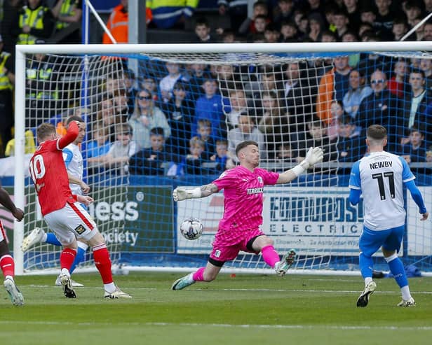 George Maris scores during the Sky Bet League 2 match against Barrow AFC at the SO Legal Stadium, 27 April 2024Photo credit : Chris & Jeanette Holloway / The Bigger Picture.media