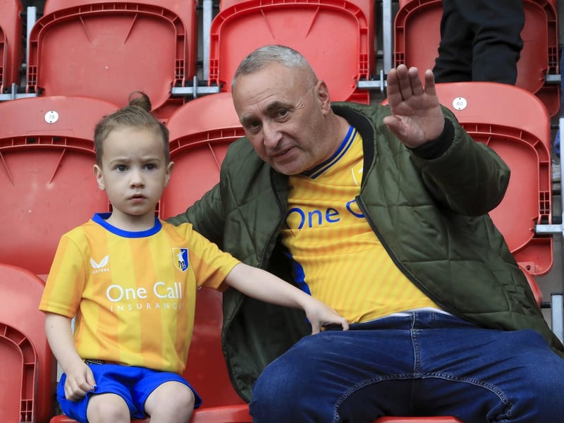 Mansfield Town battled back for a point at Rotherham to edge closer to survival.