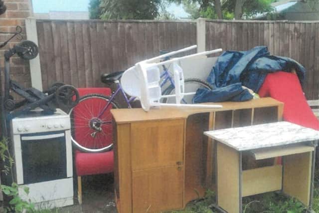 The woman was fined more than £1,000 for failing to clear rubbish from her property. Photo: ADC