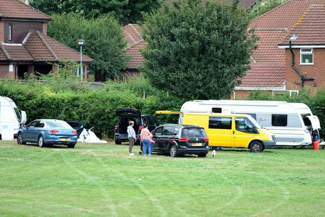 Travellers in an unauthorised encampment on Sutton Lawn in the past.
