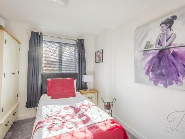 The final bedroom displays its own individual character. It benefits from fitted wardrobes, a carpeted floor, central heating radiator and window to the front of the property.
