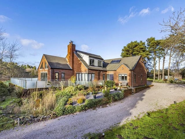 Designed as a quirky yet practical family home, the property sits comfortably within its generous grounds