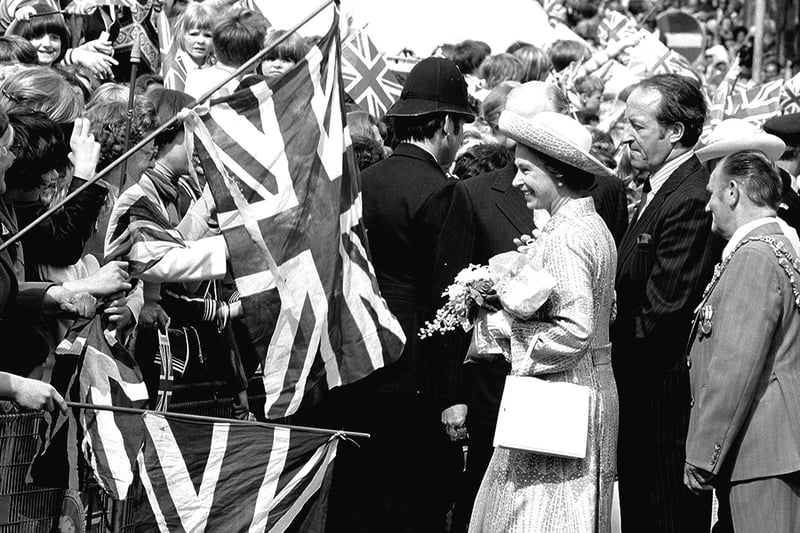 The Queen smiles during her visit to Mansfield in 1977