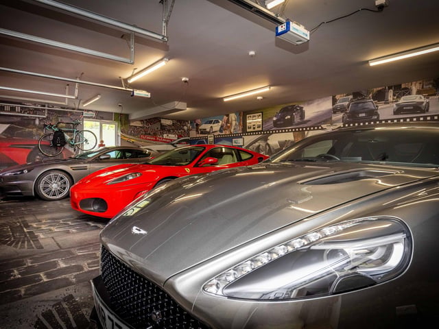 Appealing to the discerning car collector is a detached triple garage which is equally as well decorated as the house.