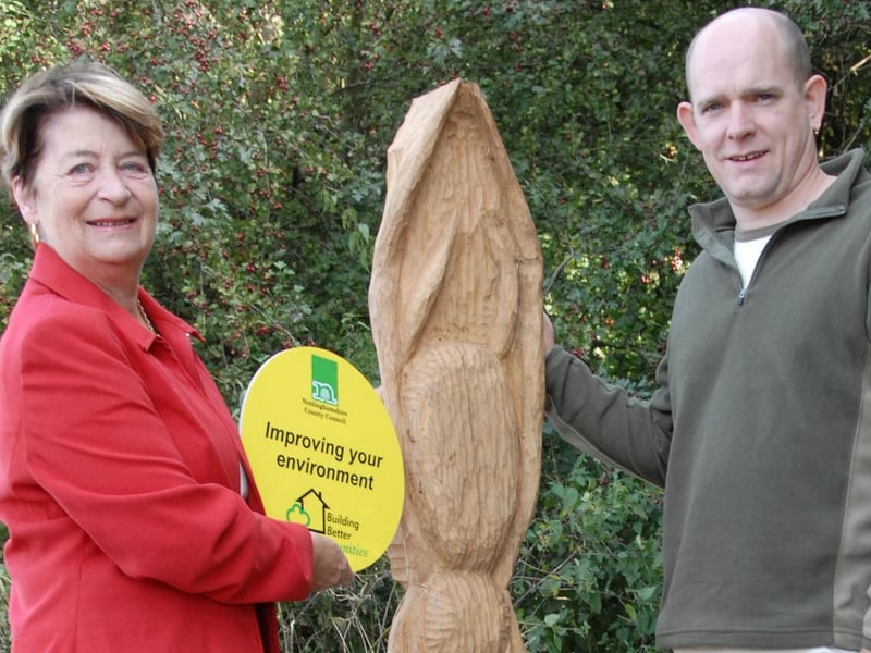 County councillor Stella Smedley, Cabinet Member for the Environment pictured with sculptor Richard James at the launch of the new entrance to Ollerton Pit Wood.