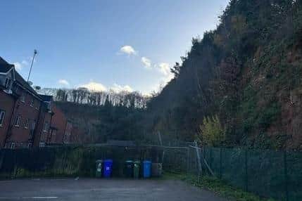 Homes on Stone Bank Close and their proximity to the cliff face of the old Berry Hill quarry.