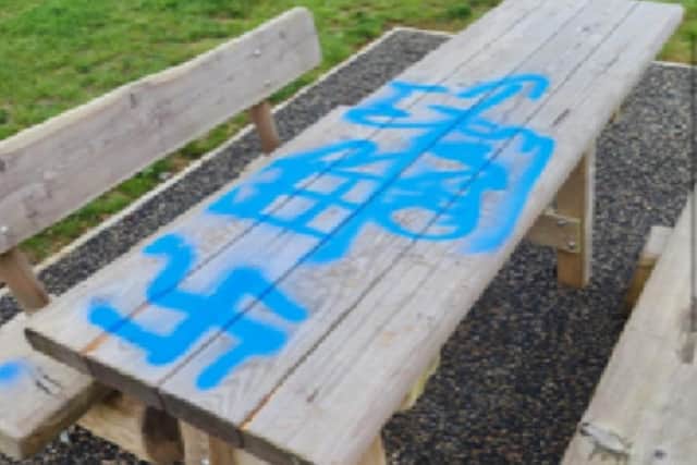 Nazi graffiti has been sprayed on benches at an Ashfield park