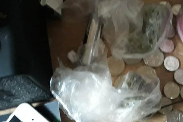 Bags of cannabis, along with cash and mobile phones were seized.