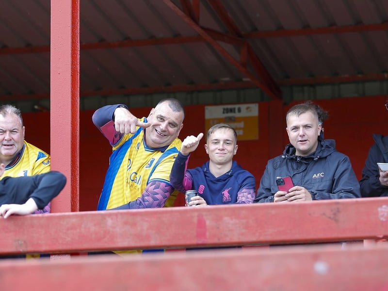 Mansfield Town fans watch a convincing 4-0 win at Alfreton Town.