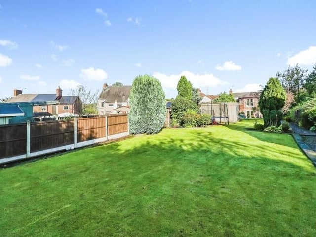 Another shot of the south-facing back garden, which is neatly enclosed.