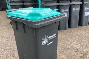 Black and teal coloured wheelie bins were delivered to more than 43,000 homes across the district