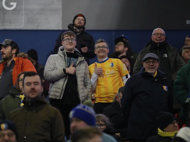Mansfield Town conceded three times in the final 15 minutes to lose at Bolton Wanderers.