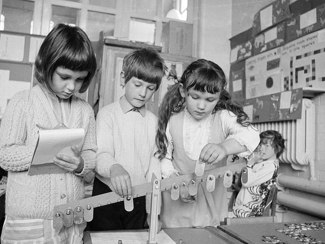 These Kirkby kids focus on the task in hand in 1970.