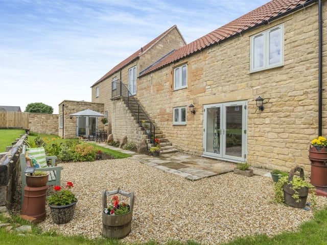 While we're here, we may as well show you the original stone steps, with black handrails, that lead from the French doors on the first-floor landing and down to the south-facing rear garden. An exquisite touch, don't you think?