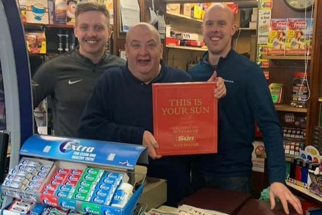 From left, Dominic Christopher, Chris White and Chris Christopher at Goddard and White newsagents in Bolsover.
