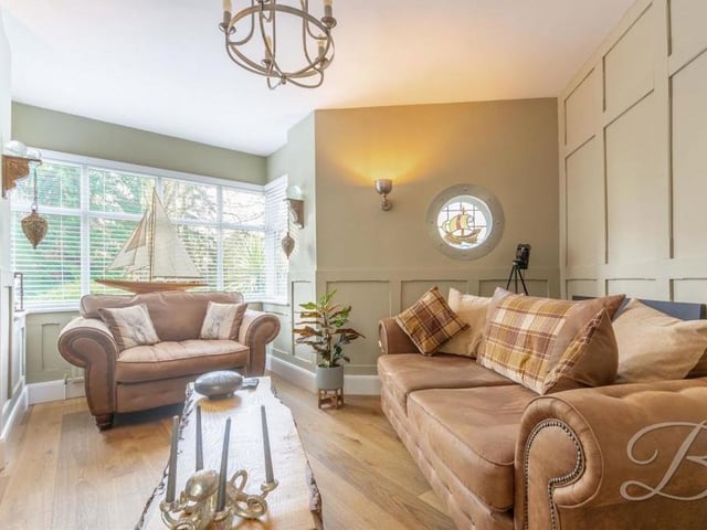 A wealth of natural light flows through the snug thanks to a large window that faces the front of the property.