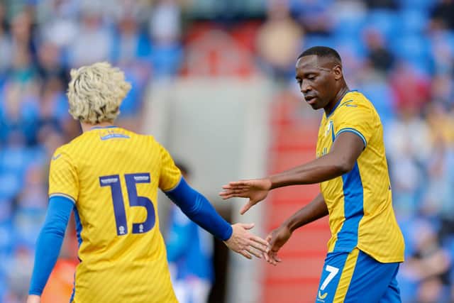 Aaron Lewis congratulates scorer Lucas Akins during the Pre Season match against Oldham Athletic AFC at the Boundary Park, 29 July 2023 
Photo Chris & Jeanette Holloway / The Bigger Picture.media