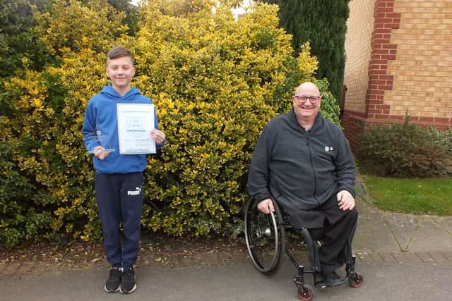 Caleb Wheatley, Covid-19 Young Hero Award winner and Pete Edwards, Discover Ashfield board member.