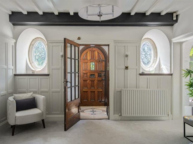 The sense of grandeur at the £800,000 house hits you as soon as you step through the front door and into the characterful entrance hallway. It features original panelling, white-washed ceiling beams and feature decorative windows.