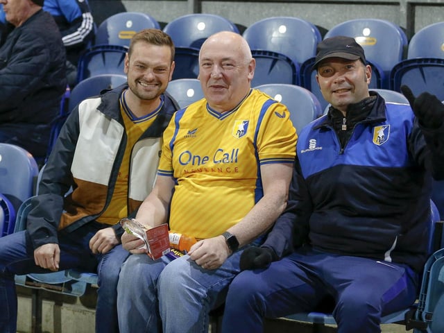 Mansfield Town fans watching the draw with Wrexham.