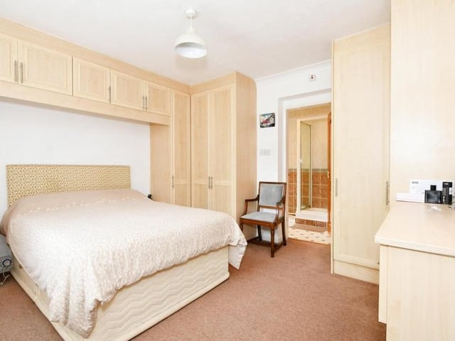 This is bedroom number three at the £800,000 Nottingham Road residence. It is laced with wardrobe and storage space and benefits from en suite facilities.