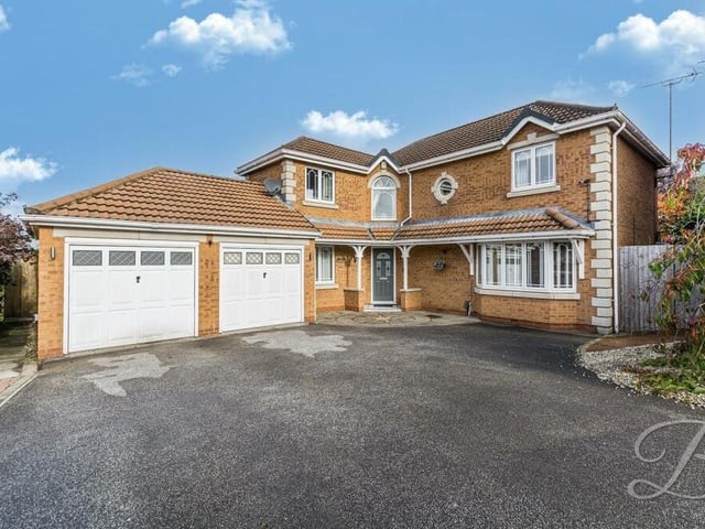 Let's take a look at the exterior of the Fitzwilliam Drive property now, starting with the impressive double garage at the front.