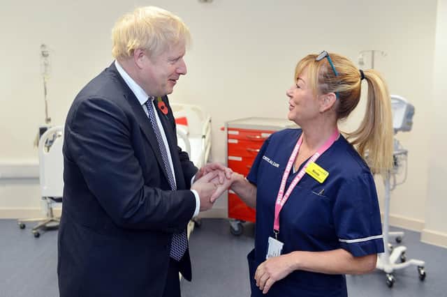 Prime Minister Boris Johnson, seen here on a visit to King's Mill Hospital in Sutton, hopes his levelling up policy will benefit areas such as Mansfield and Ashfield.