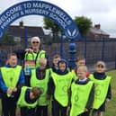 Environment champion Danny Thompson with youngsters at Mapplewells School in Sutton.