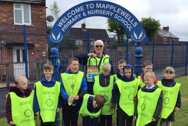 Environment champion Danny Thompson with youngsters at Mapplewells School in Sutton.