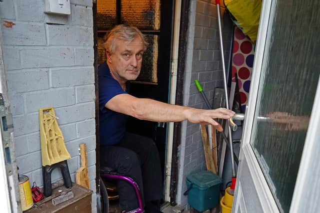 Dion said he struggles with the narrow doorways at his property.