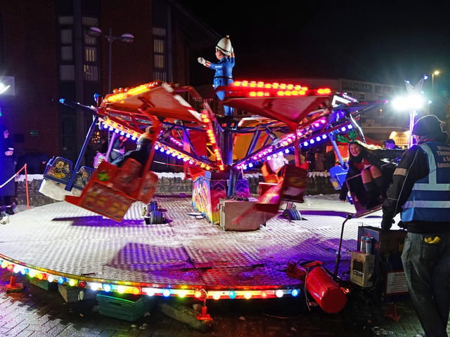 Enjoying a fairground ride at the lights switch-on.