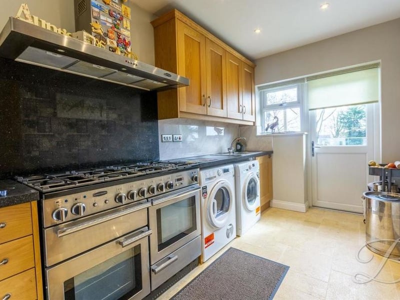 The utility room at the Lichfield Lane property is as good as many kitchens. There is space for a Rangemaster dual-fuel oven, and space and plumbing for a washing machine and tumble dryer. It comes complete with a range of wall and base units, with work surface over and inset sink and drainer.