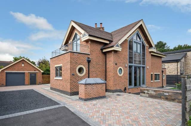 This striking five-bedroom property on Kighill Lane, Ravenshead is so unique that it has its own multi-hole putting green in the garden. It is on the market for £749,500 with estate agents Gascoines.