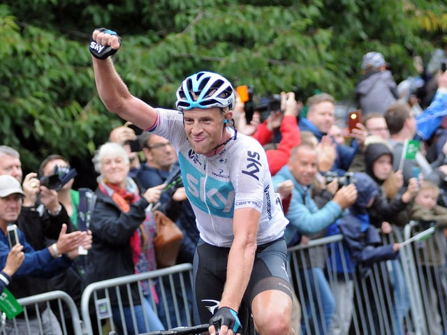 The winner, Ian Stannard makes his way past the finish post to applause from waiting fans.
