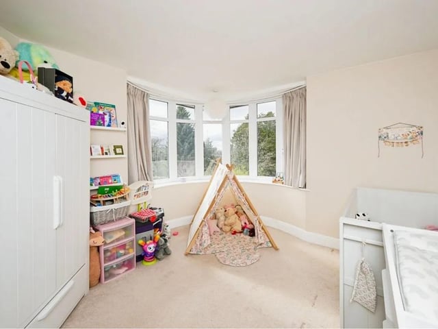 The property features ample bedroom space