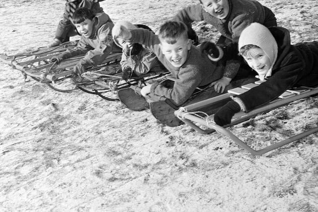 Youngsters sledging on Corstorphine Hill in December 1964.